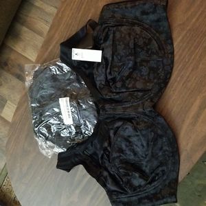 Two Cortland black bras